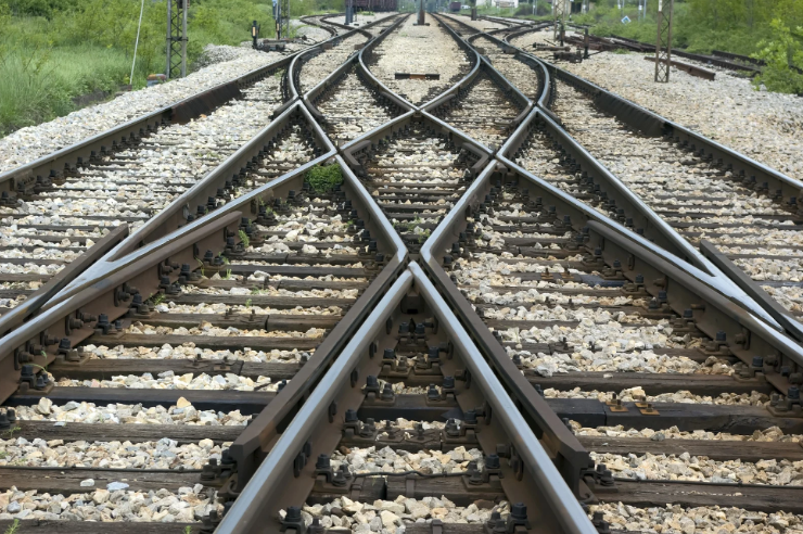 Intersecting train tracks representing divergent paths and uncertainty—symbolizing the personal journey of exploring neurodivergence and ADHD.